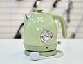 Modern vintage teapot on sale in a home appliance store - PhotoDune Item for Sale