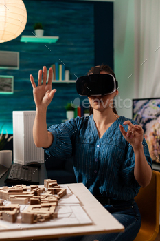 Construction architect using modern vr glasses device / Photodune, Misc