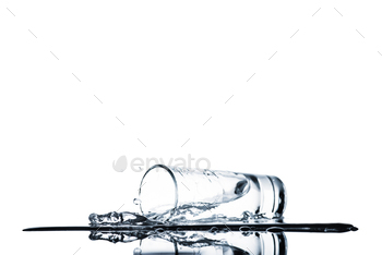 fresh water spilling from glass isolated on white / Photodune, Misc