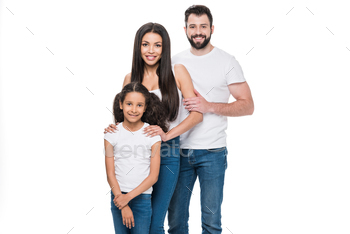 young multiethnic family in casual clothing looking at camera isolated on white / Photodune, Misc