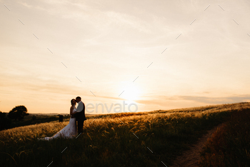 A couple in love a guy and a girl on a walk in the forest belt / Photodune, Misc