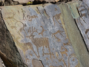 Stones with of people and animals petroglyphs / Photodune, Misc