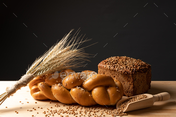 Fresh, fragrant bread on the table. Food concept / Photodune, Misc