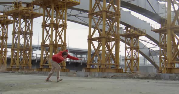 Sportsman Parkouring at Construction Site