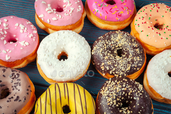 Glazed donuts on wooden background. creative photo / Photodune, Misc