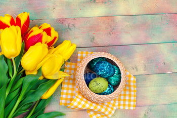 Easter eggs and tulips on wooden planks / Photodune, Misc