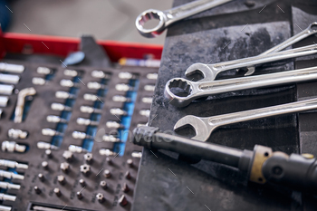 Auto repair kit and wrenches at car service station / Photodune, Misc