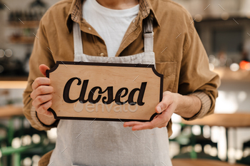 Young man waiter in apron / Photodune, Misc