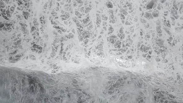 Scenic view of sea with foamy waves