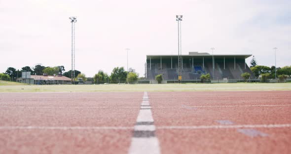 Athlete Running on The Running Track