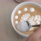 Close-up shot of barista finishing cream picture on latte matcha - VideoHive Item for Sale