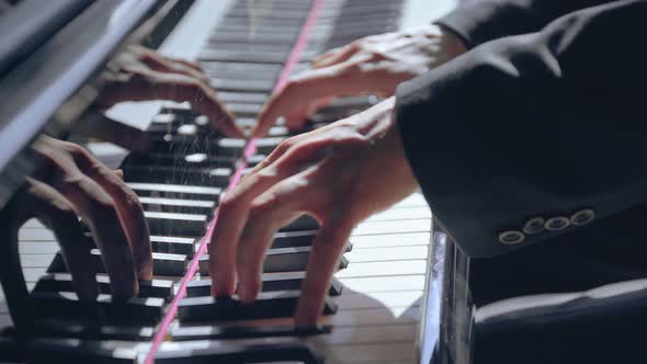 Closeup of Professional Pianist Play the Piano