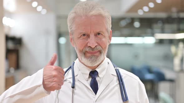 Senior Doctor Showing Thumbs Up
