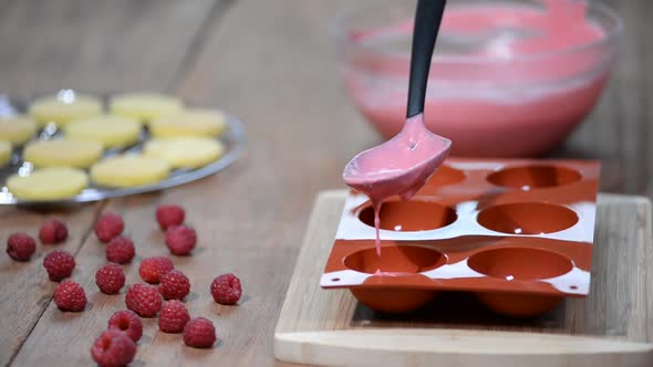 Preparation of tasty mousse cake. French mousse cakes with mirror glaze. Modern european dessert