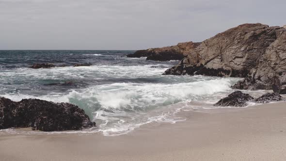 Small waves gently come ashore on a Northern California beach.