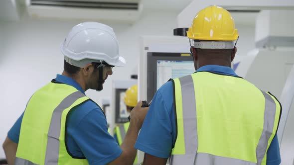 Group of diversity worker people wearing protective safety helmet and glasses in industry factory.