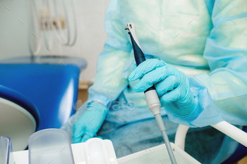 Ultrasonic scaler in the dental office. Dentistry Concept / Photodune, Misc