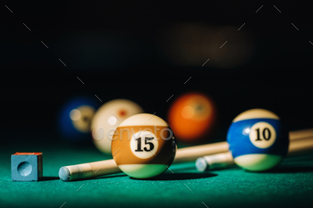 Billiard table with green surface and balls in the billiard club.Pool Game / Photodune, Misc