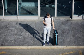 Man using mobile app in smart phone / Photodune, Misc