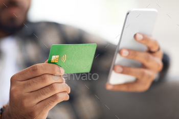 Credit card and modern mobile phone in male hands / Photodune, Misc