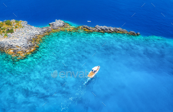 Speed boat on blue sea at sunny day in summer. Aerial view / Photodune, Misc