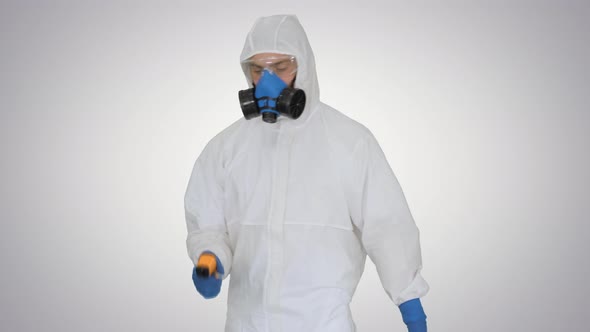 Doctor in Protective Suit Checking Your Temperature on Gradient Background