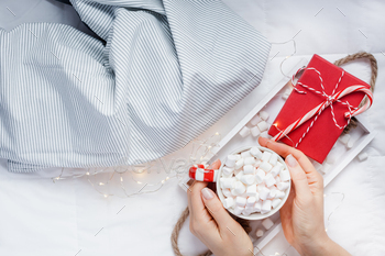 Christmas or New Year morning in bed concept / Photodune, Misc