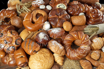 Assorted breads isolated on white / Photodune, Misc