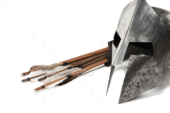Ancient helmet and wooden arrows isolated on white / Photodune, Misc
