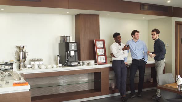 Handsome Guys Discussing Some Problems at Work