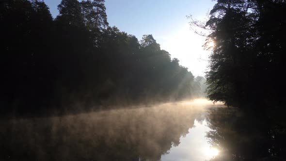 Fog, Grass, Trees Against the Backdrop of River and Nature. Fishing Background. Misty Morning