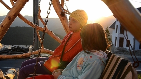 Girls On Swing