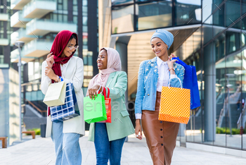 Beautiful muslim girl wearing hijab bonding outdoors / Photodune, Misc