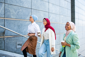 Beautiful muslim girl wearing hijab bonding outdoors / Photodune, Misc