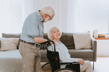 Senior couple, wife takes care of invalid husband / Photodune, Misc
