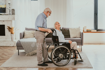 Senior couple, husband takes care of invalid wife / Photodune, Misc