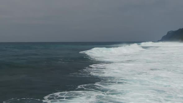 Ocean Surf Waves at High Tide in Indonesia Bali