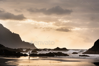 People on the sandy beach of Benijo on the island of Tenerife.Spain / Photodune, Misc