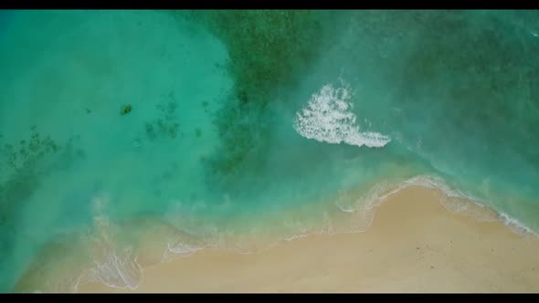 Aerial above tourism of beautiful coast beach break by blue sea and white sandy background of a dayt