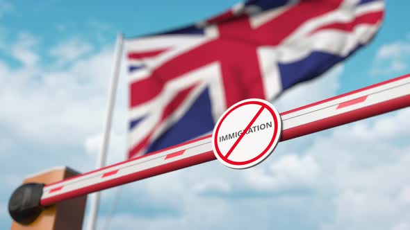 Barrier with No Immigration Sign Opened at Flag of the UK