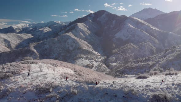 Aerial Shot of Small Hikers in the Beautiful Mountains