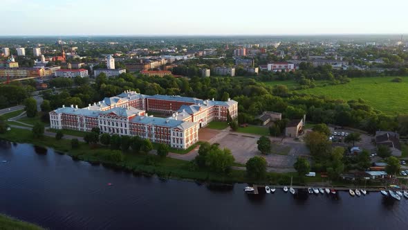 Aerial View of Jelgava City Panorama and Lielupe River in Latvia, Zemgale at Sunset 4K Dron Shot