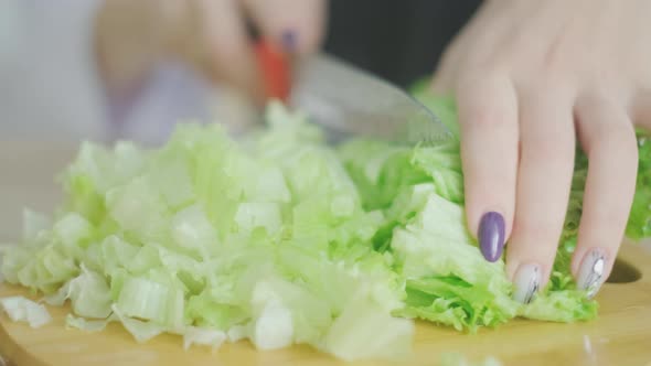 A Young Woman is Cooking