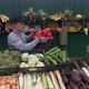 Red Peppers at the Farmers' Market. Slow Motion 2x. - VideoHive Item for Sale
