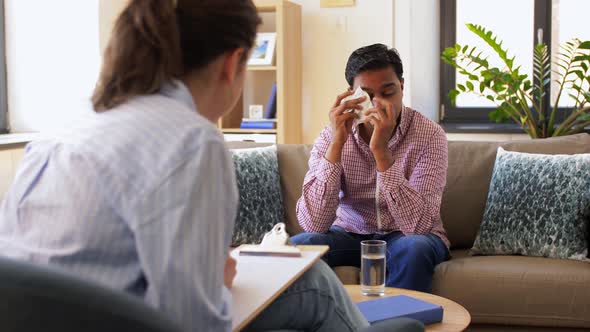 Crying Man at Psychotherapy Session