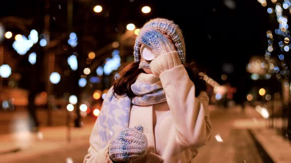 Happy Woman Drinking Coffee in Christmas City