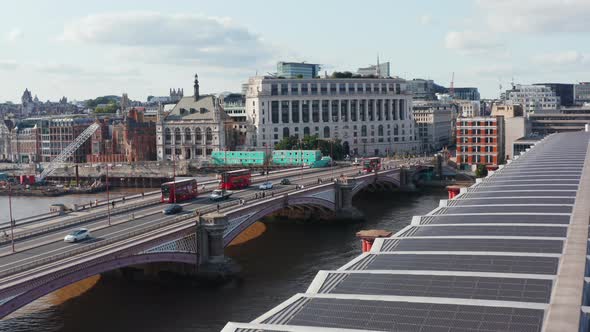 Aerial View of Traffic of Bridge Over Thames River