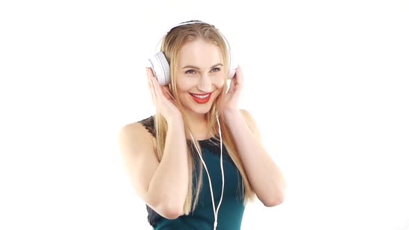 Beauty Woman Listening Music in Headphone