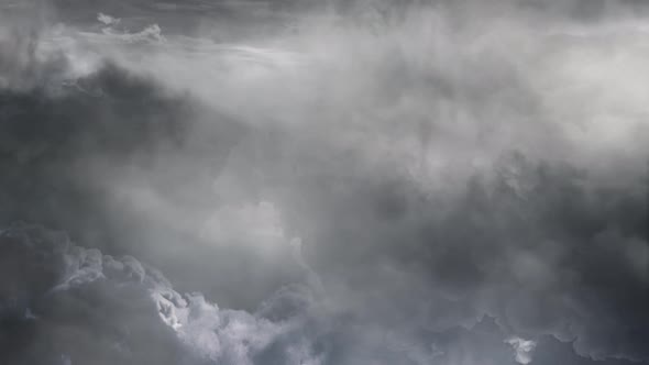 thunderstorm within a thick,dark  cumulus cloud 4k