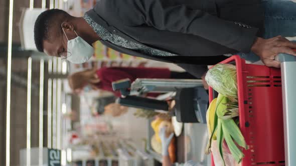 Portrait Of Businessman In Supermarket